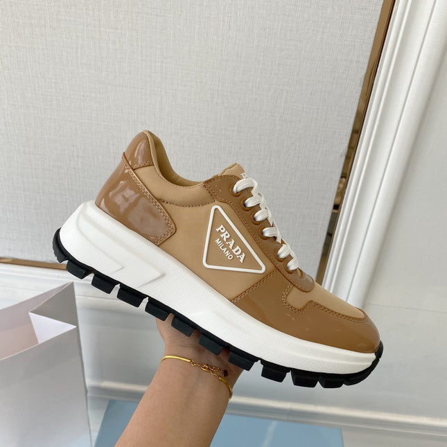 PRADA 25S THICK SOLE SNEAKER IN BROWN CALFSKIN AND CANVAS