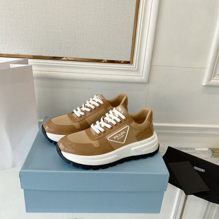 PRADA 25S THICK SOLE SNEAKER IN BROWN CALFSKIN AND CANVAS