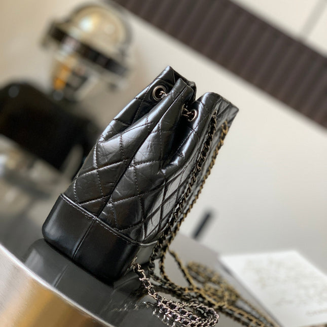 CHANEL 25S GRABRIELLE BACKPACK 24 CM IN BLACK LAMBSKIN