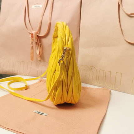 WANDER MATELASSÉ NAPPA HOBO BAG 23 IN YELLOW LAMBSKIN