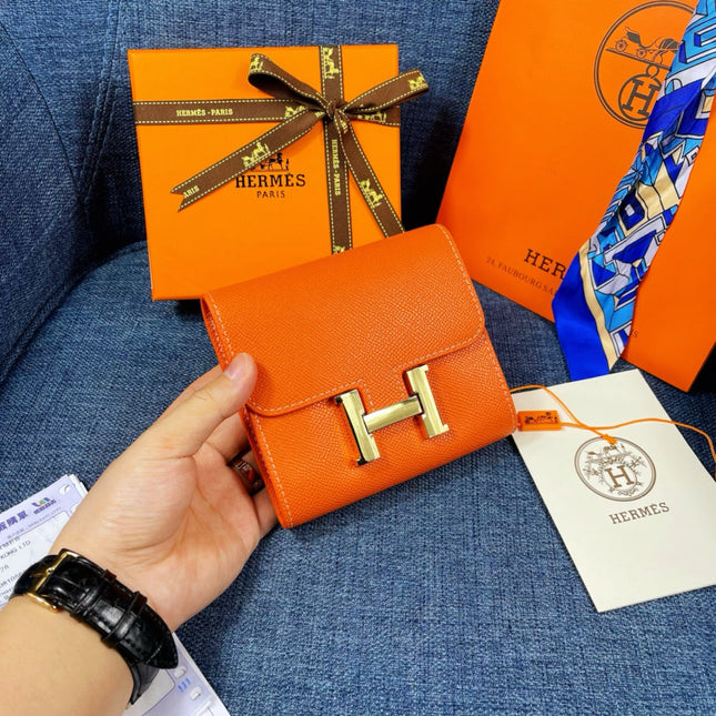 HM CONSTANCE 12 ORANGE CALFSKIN GOLD HARDWARE