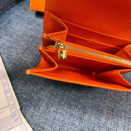HM CONSTANCE 12 ORANGE CALFSKIN GOLD HARDWARE