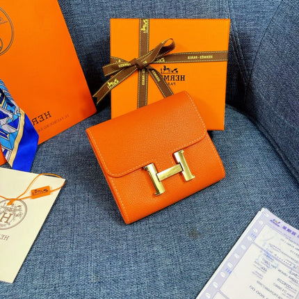 HM CONSTANCE 12 ORANGE CALFSKIN GOLD HARDWARE
