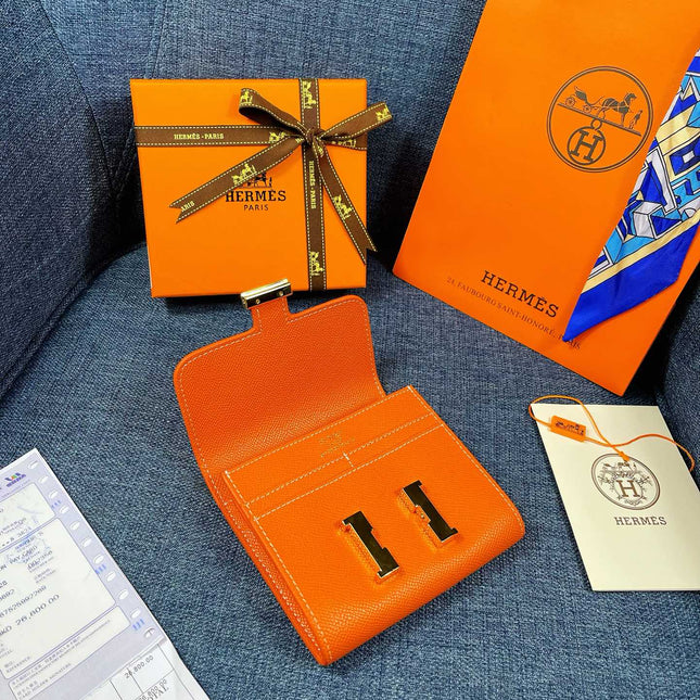 HM CONSTANCE 12 ORANGE CALFSKIN GOLD HARDWARE