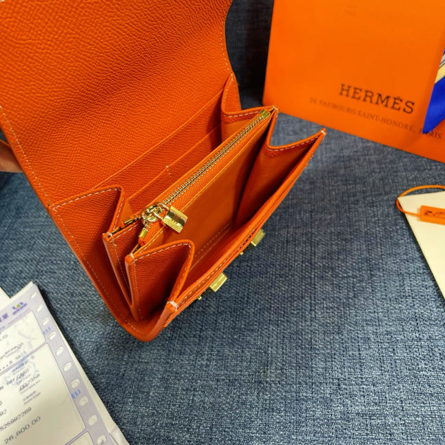 HM CONSTANCE 12 ORANGE CALFSKIN GOLD HARDWARE