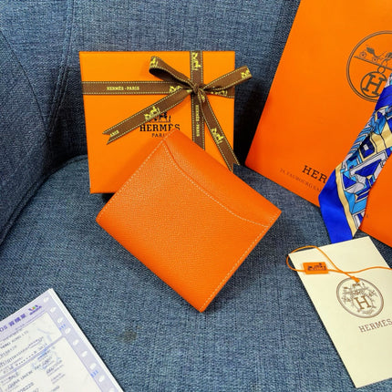 HM CONSTANCE 12 ORANGE CALFSKIN GOLD HARDWARE