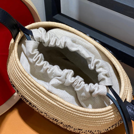 LOE 18 ANAGRAM BASKET BAG IN BLACK AND NATURAL RAFFIA