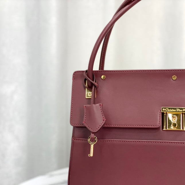 PARISIENNE 30 HANDBAG IN MULBERRY PURPLE SMOOTH CALFSKIN