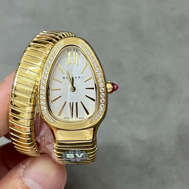SERPENTI TUBOGAS QUARTZ YELLOW GOLD ATTACHED DIAMOND BEZEL SILVER OPALINE DIAL