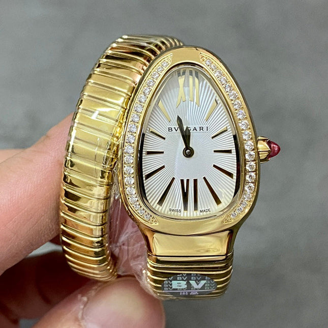 SERPENTI TUBOGAS QUARTZ YELLOW GOLD ATTACHED DIAMOND BEZEL SILVER OPALINE DIAL