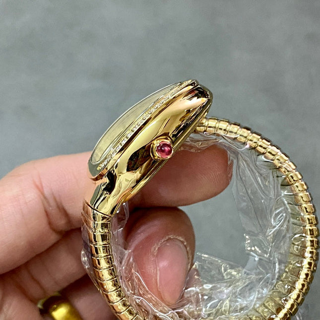 SERPENTI TUBOGAS QUARTZ YELLOW GOLD ATTACHED DIAMOND BEZEL SILVER OPALINE DIAL