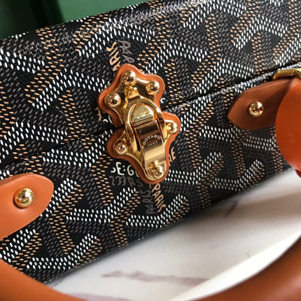 GRAND HÔTEL TRUNK BAG 24 IN BLACK GOYARDINE CANVAS AND TAN CALFSKIN