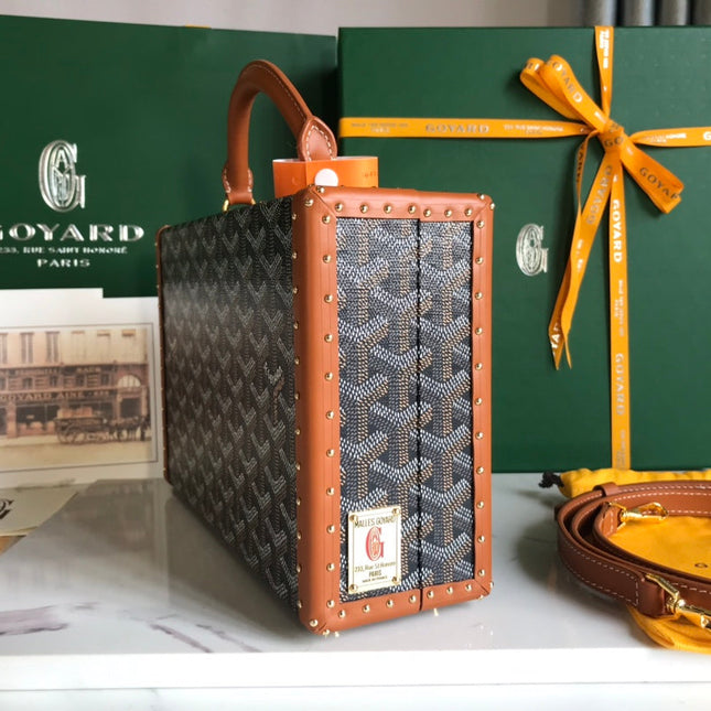 GRAND HÔTEL TRUNK BAG 24 IN BLACK GOYARDINE CANVAS AND TAN CALFSKIN