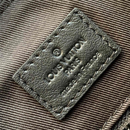 DISCOVERY BACKPACK 54 IN BLACK EMBOSSED MONOGRAM CALFSKIN