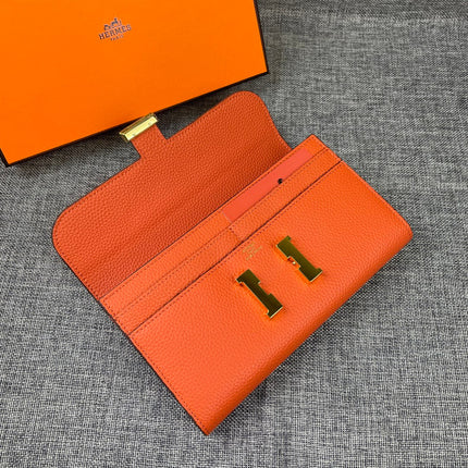 HM CLUTCH CONSTANCE 22 ORANGE CALFSKIN GOLD HARDWARE