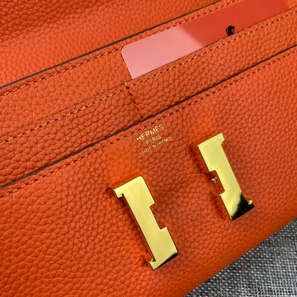 HM CLUTCH CONSTANCE 22 ORANGE CALFSKIN GOLD HARDWARE