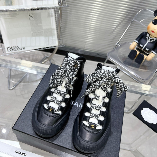 CC CANO ALTO SNEAKER IN BLACK CALFSKIN AND RUBBER