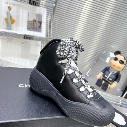 CC CANO ALTO SNEAKER IN BLACK CALFSKIN AND RUBBER