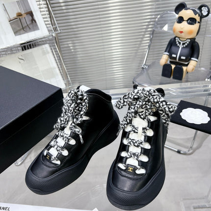 CC CANO ALTO SNEAKER IN BLACK CALFSKIN AND RUBBER