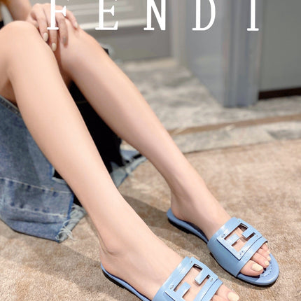 FENDI BAGUETTE SLIDES IN  BABY BLUE LAMBSKIN