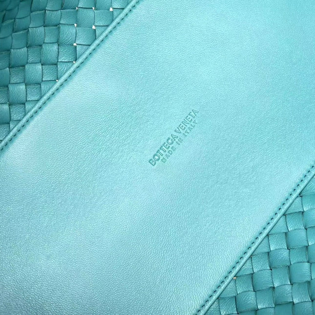 SMALL CABAT 32 IN TEAL BLUE LAMBSKIN