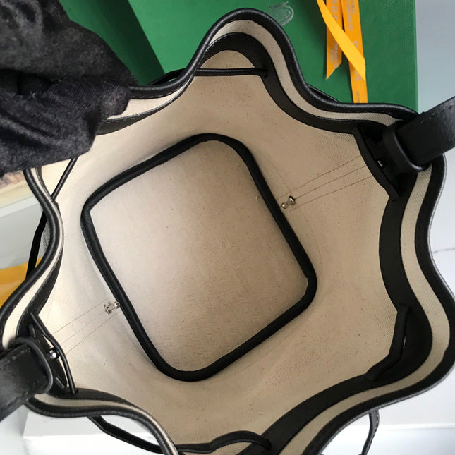 PETIT FLOT BUCKET BAG 22 IN BLACK GOYARDINE CANVAS AND LAMBSKIN TRIM