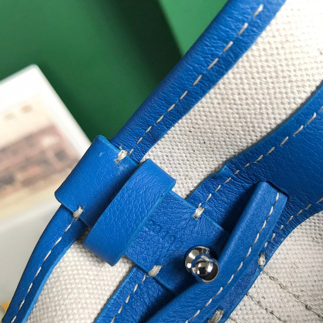 PETIT FLOT BUCKET BAG 22 IN SAPPHIRE BLUE GOYARDINE CANVAS AND LAMBSKIN TRIM