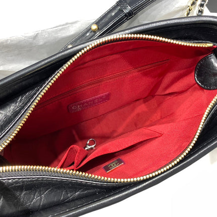 HOBO BAG 25 WITH STRAP IN BLACK CALFSKIN GOLD AND SILVER HARDWARE