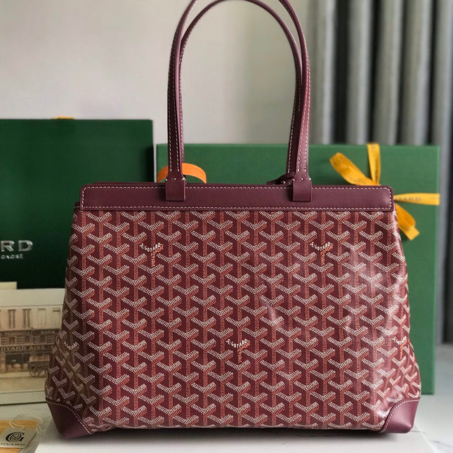 BELLECHASSE BIAUDE PM BAG 36 IN WINE RED GOYARDINE CANVAS AND CALFSKIN TRIM