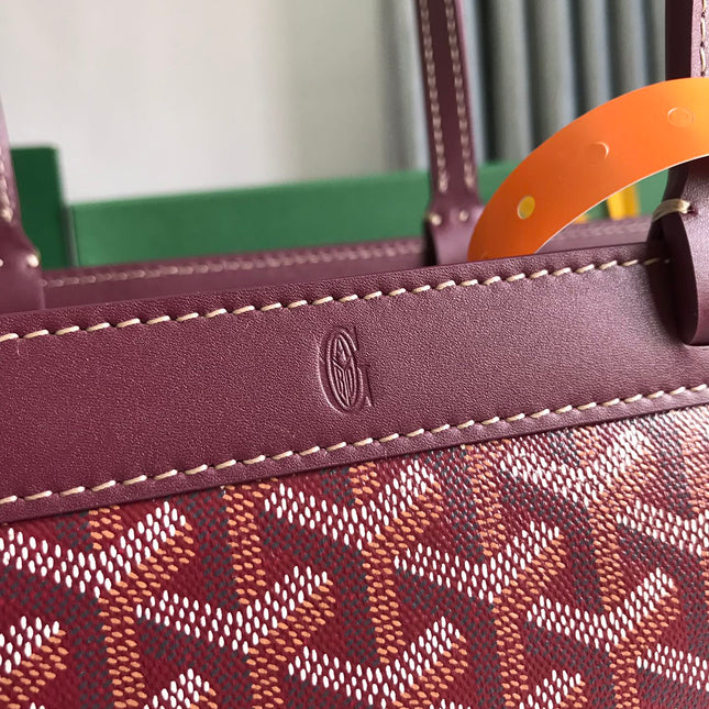 BELLECHASSE BIAUDE PM BAG 36 IN WINE RED GOYARDINE CANVAS AND CALFSKIN TRIM