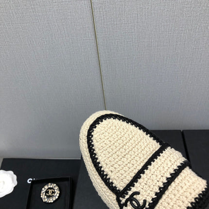 HALF-MULES IN CREAM WOOL WOVEN