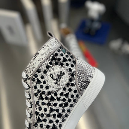 SPIKE STUDDED HIGH-TOP SNEAKERS IN WHITE MIX BLACK CALFSKIN