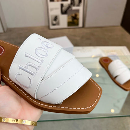 WOODY MULE IN WHITE LAMBSKIN WITH EMBROIDERED LOGO