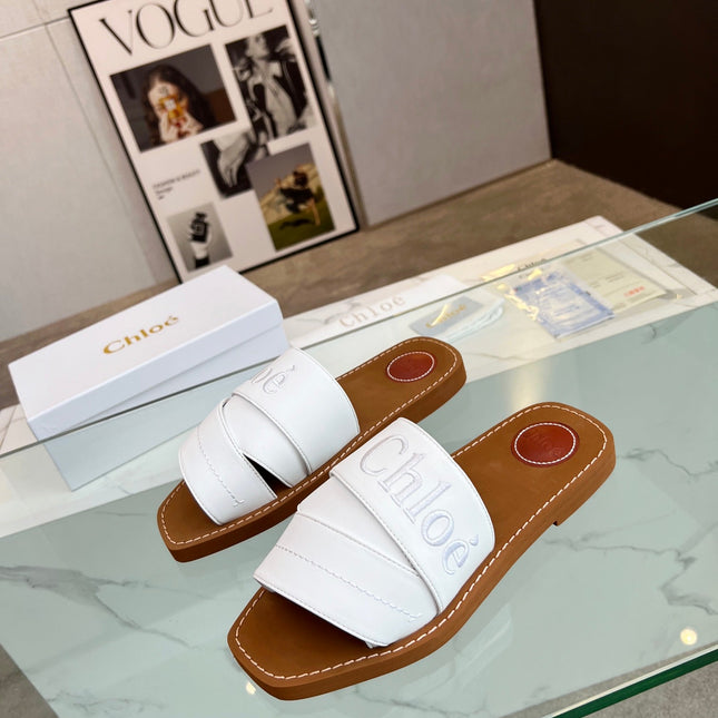 WOODY MULE IN WHITE LAMBSKIN WITH EMBROIDERED LOGO