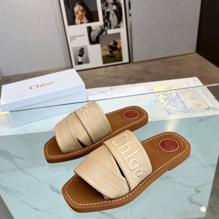WOODY MULE IN TUSCAN BEIGE LAMBSKIN WITH EMBROIDERED LOGO