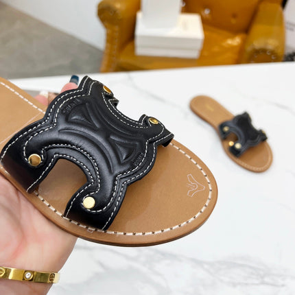TRIOMPHE SLIDE IN BLACK CALFSKIN