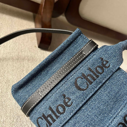 MINI WOODY TOTE BAG 20 IN BLUE DENIM BLACK CALFSKIN