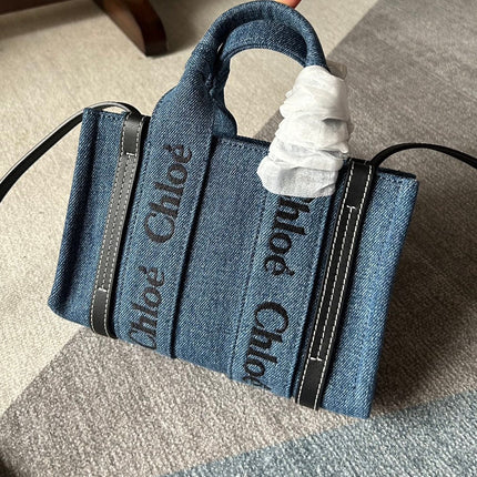 MINI WOODY TOTE BAG 20 IN BLUE DENIM BLACK CALFSKIN