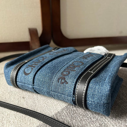 MINI WOODY TOTE BAG 20 IN BLUE DENIM BLACK CALFSKIN