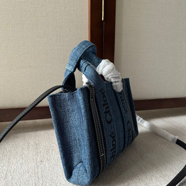 MINI WOODY TOTE BAG 20 IN BLUE DENIM BLACK CALFSKIN