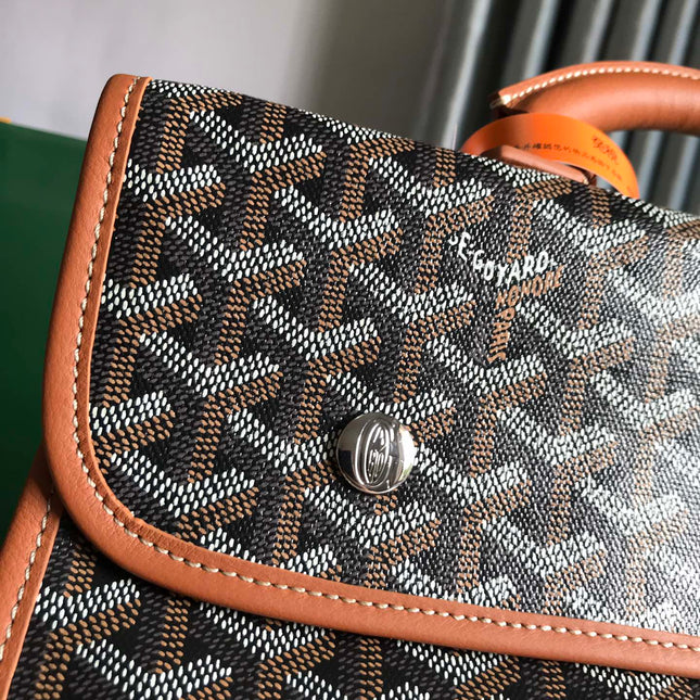 SAINT LÉGER BACKPACK 35 IN BROWN GOYARDINE CANVAS AND CALFSKIN WITH CARTOON PATCH