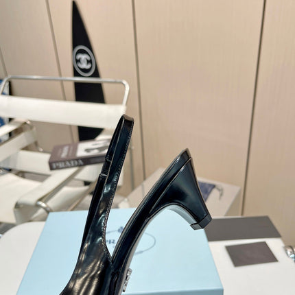 SLINGBACK KITTEN HEEL IN BLACK SHINY CALFSKIN ATTACHED FLOWERS