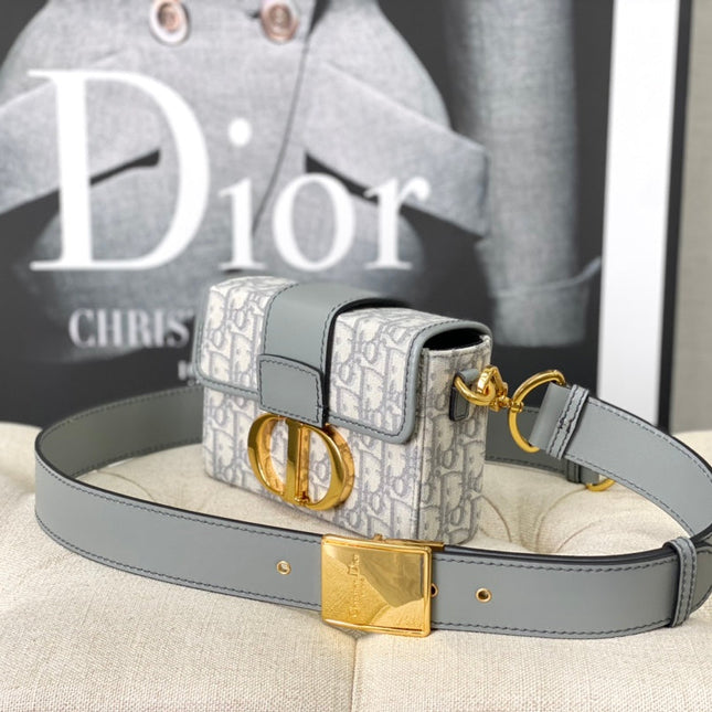 MONTAIGNE 19 HANDBAG IN GREY CALFSKIN