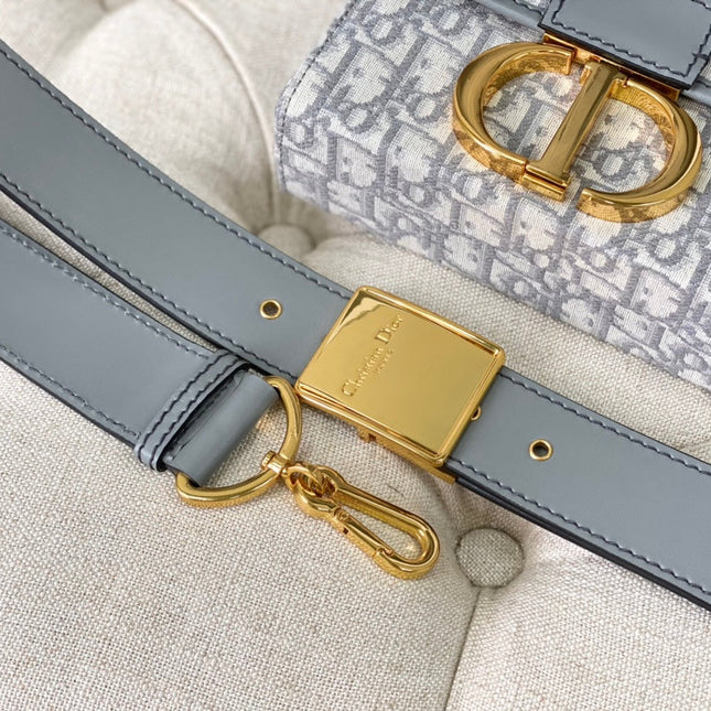 MONTAIGNE 19 HANDBAG IN GREY CALFSKIN