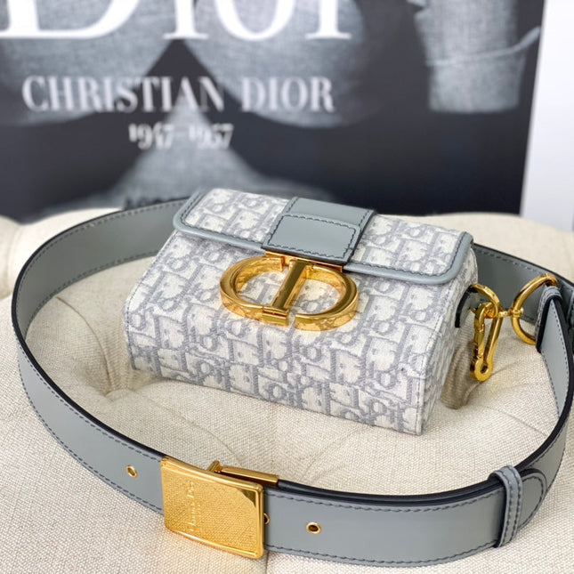 MONTAIGNE 19 HANDBAG IN GREY CALFSKIN