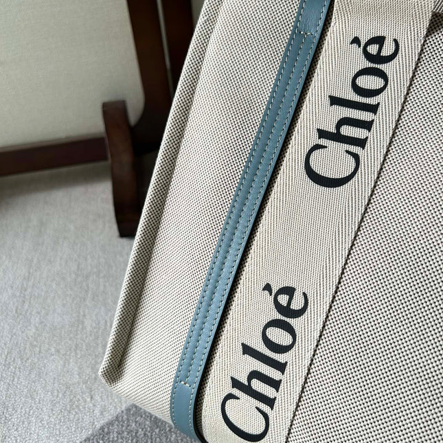 LAGRE WOODY TOTE BAG 45 IN BEIGE LINEN CANVAS BLACK WEBBING LOGO EMBROIDER BLUE CALFSKIN
