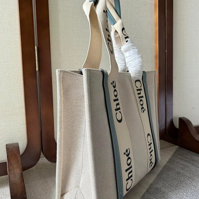 LAGRE WOODY TOTE BAG 45 IN BEIGE LINEN CANVAS BLACK WEBBING LOGO EMBROIDER BLUE CALFSKIN