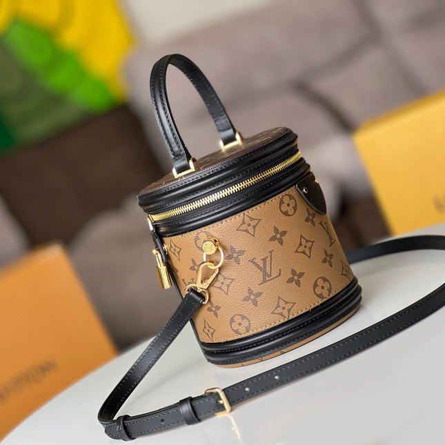 LV 25S PETIT NOE  16 IN BROWN MONOGRAM COATED CANVAS LEATHER TRIM BLACK
