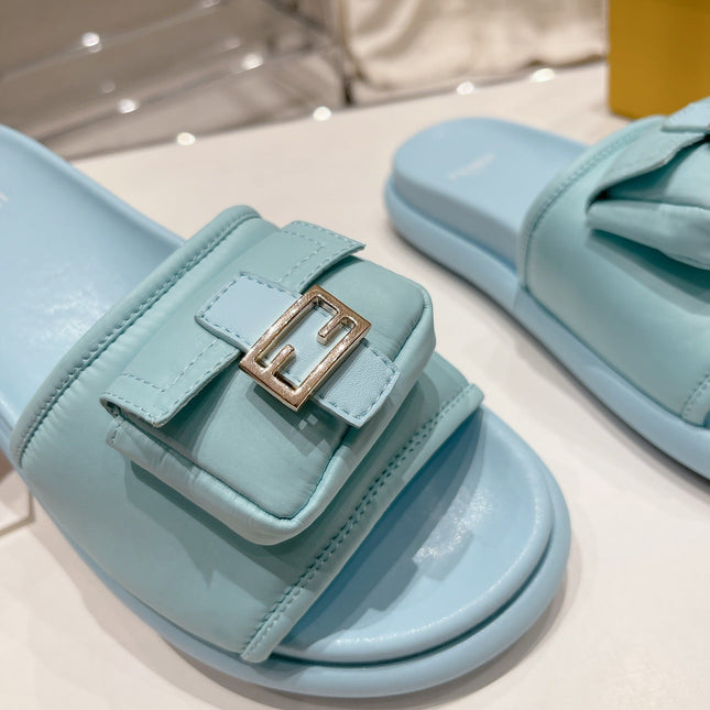 FENDI BAGUETTE SLIPPERS IN SKY BLUE LAMBSKIN WITH GOLD HARDWARE