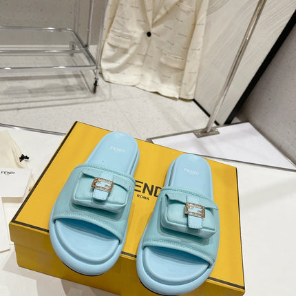 FENDI BAGUETTE SLIPPERS IN SKY BLUE LAMBSKIN WITH GOLD HARDWARE
